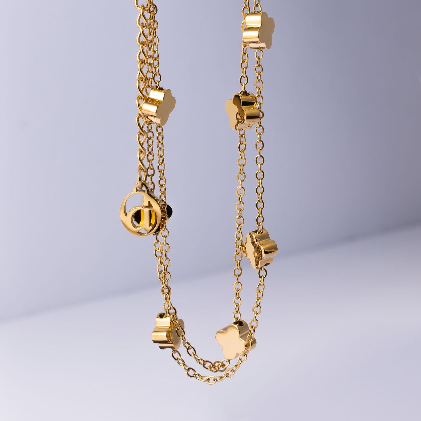 Dubbele klaver ketting armband goud