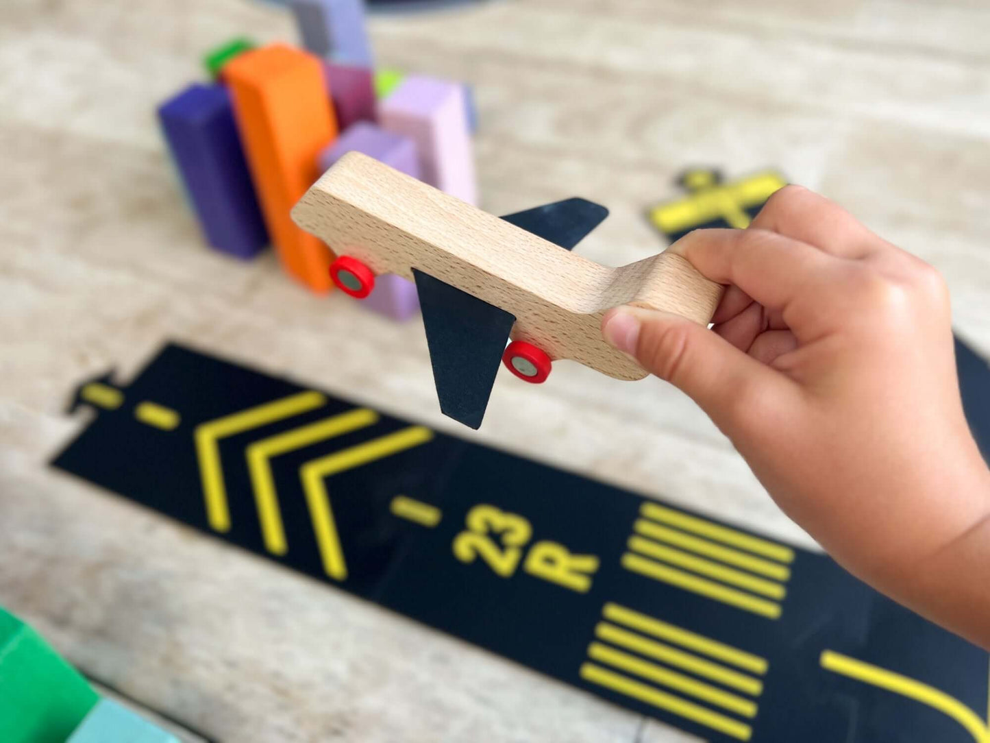 This unique wooden airplane, crafted from sustainable beech wood with upcycled wings made from Waytoplay's own misprinted road pieces, inspires endless imaginative adventures. The flexible wings let your child fly through the skies! Eco-conscious and burs