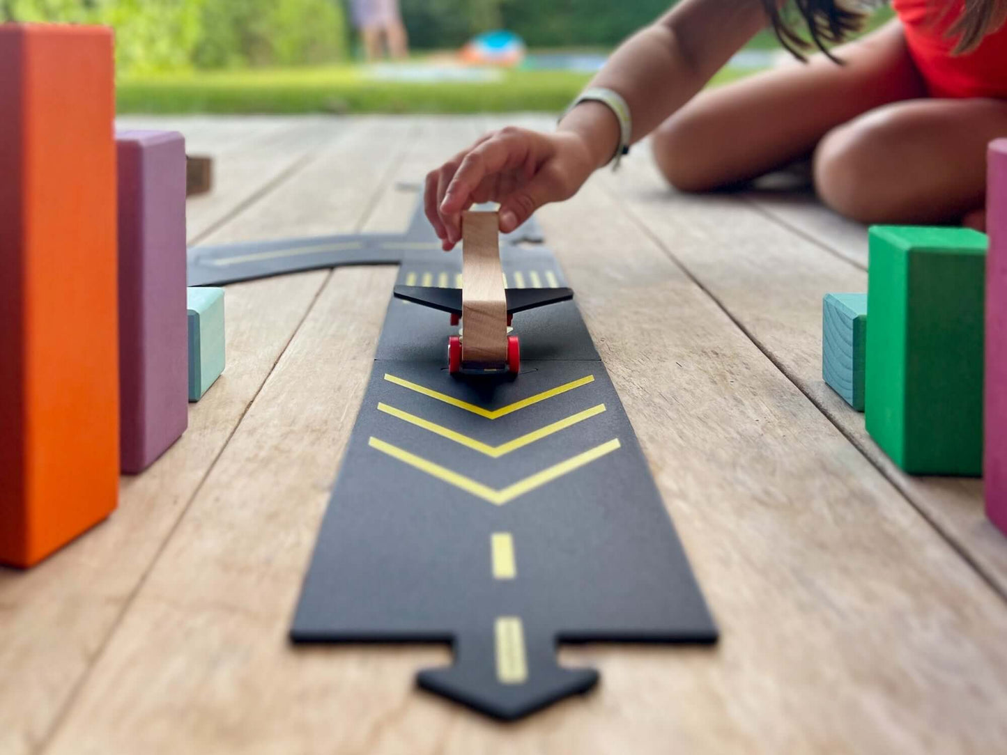 Spark your child's imagination and creativity with the new Runway from Waytoplay Toys. Watch as your little one transforms into a pilot with this airport themed set made of yellow screen printed graphics that are typical markings that can be seen on airpo